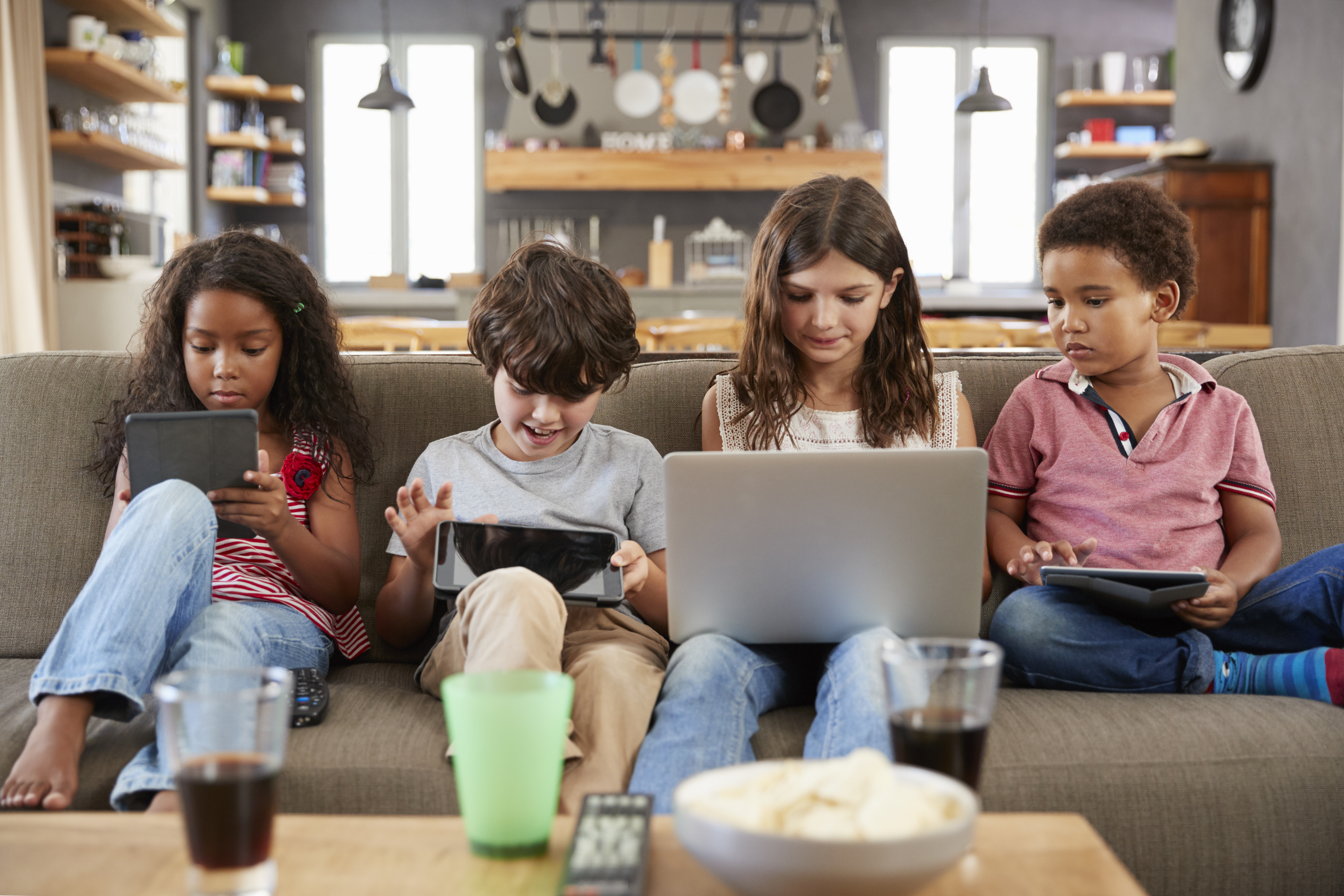 groups of kids using screens